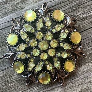 Black and green brooch, unsigned. GVC